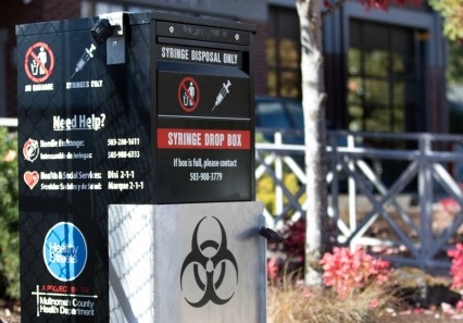 Safe syringe disposal unit in a community with a syringe services program